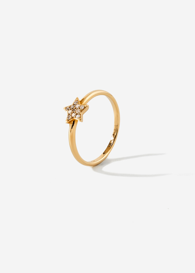 Gold ring with a diamond star.
