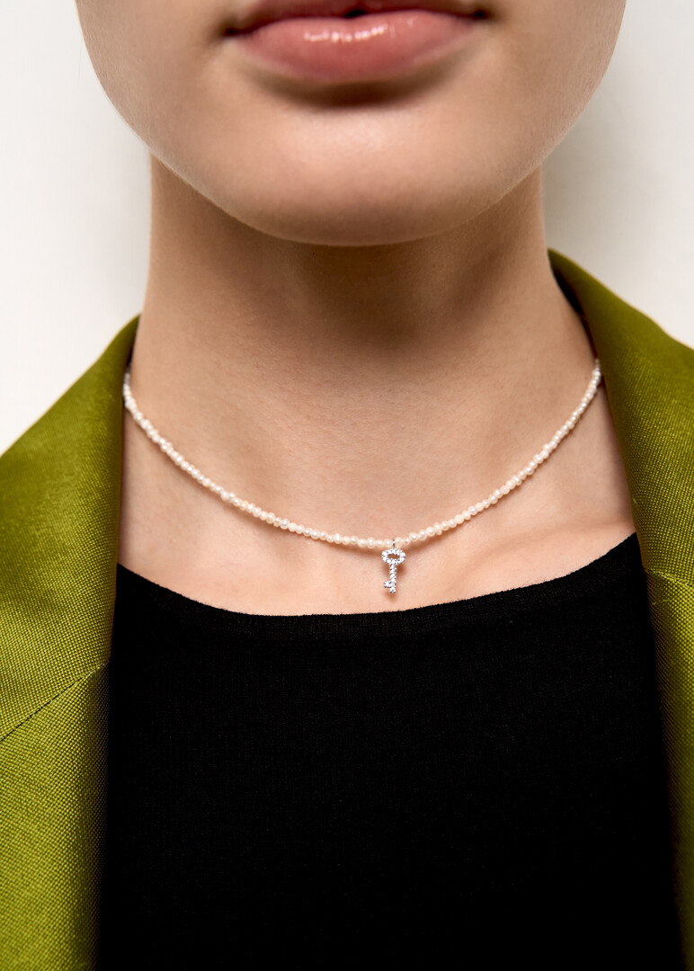 Necklace with a key