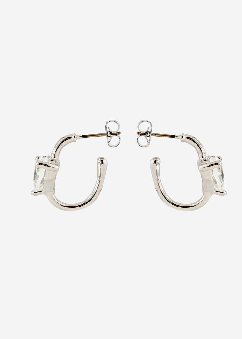 silver hoop earrings with crystals in the shape of hearts