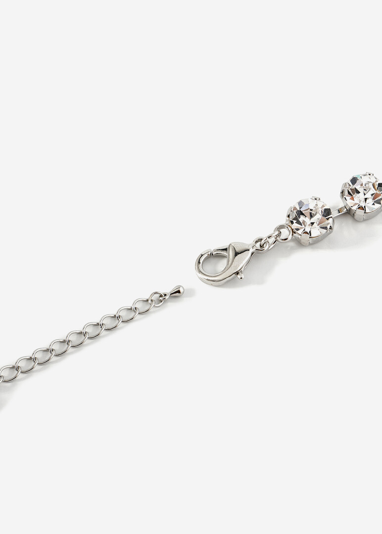 silver bracelet with round crystals