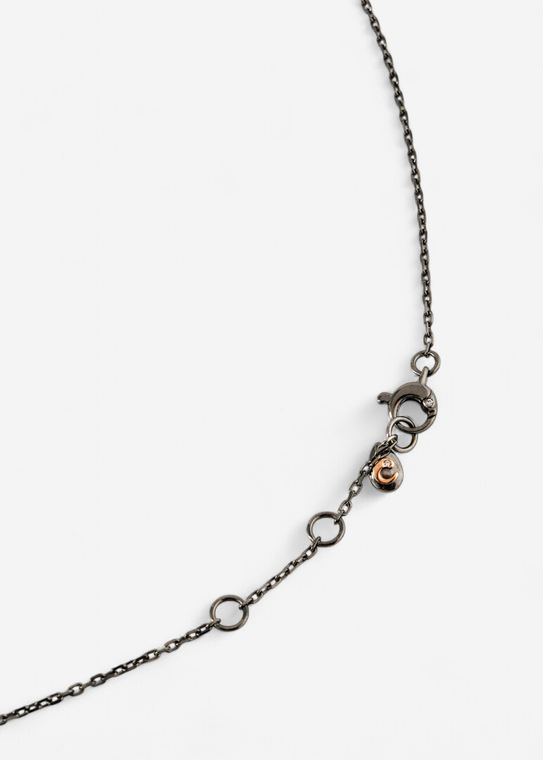 Pendant necklace with black diamonds