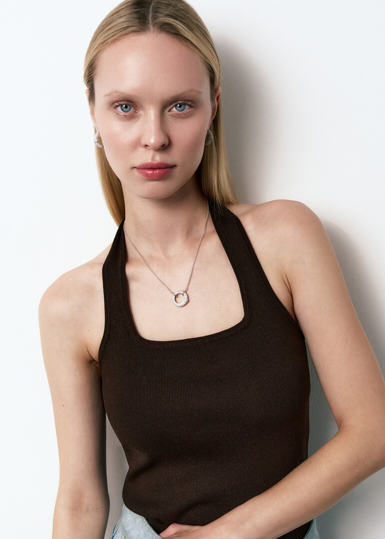 rhodium-plated necklace with a pendant of white crystals
