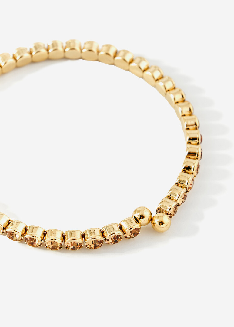 golden bracelet with round crystals