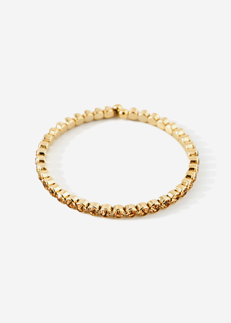 golden bracelet with round crystals