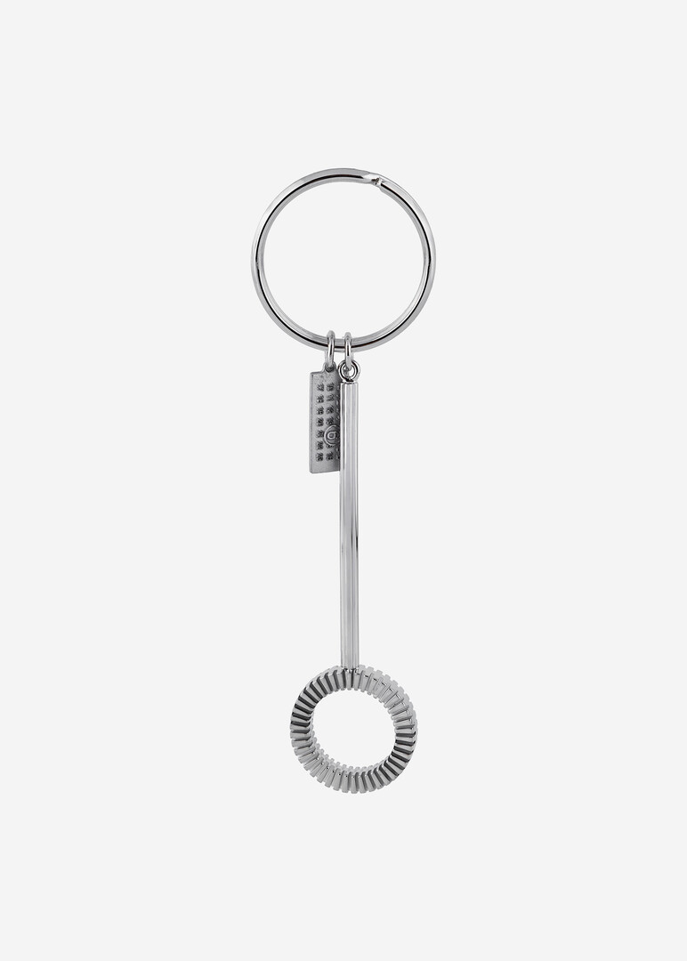 серебристый брелок MM6