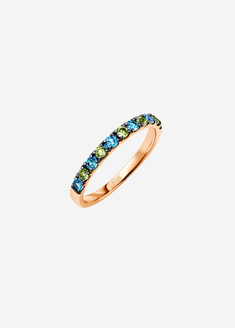 gold ring with chrysolites and cubic zirconias