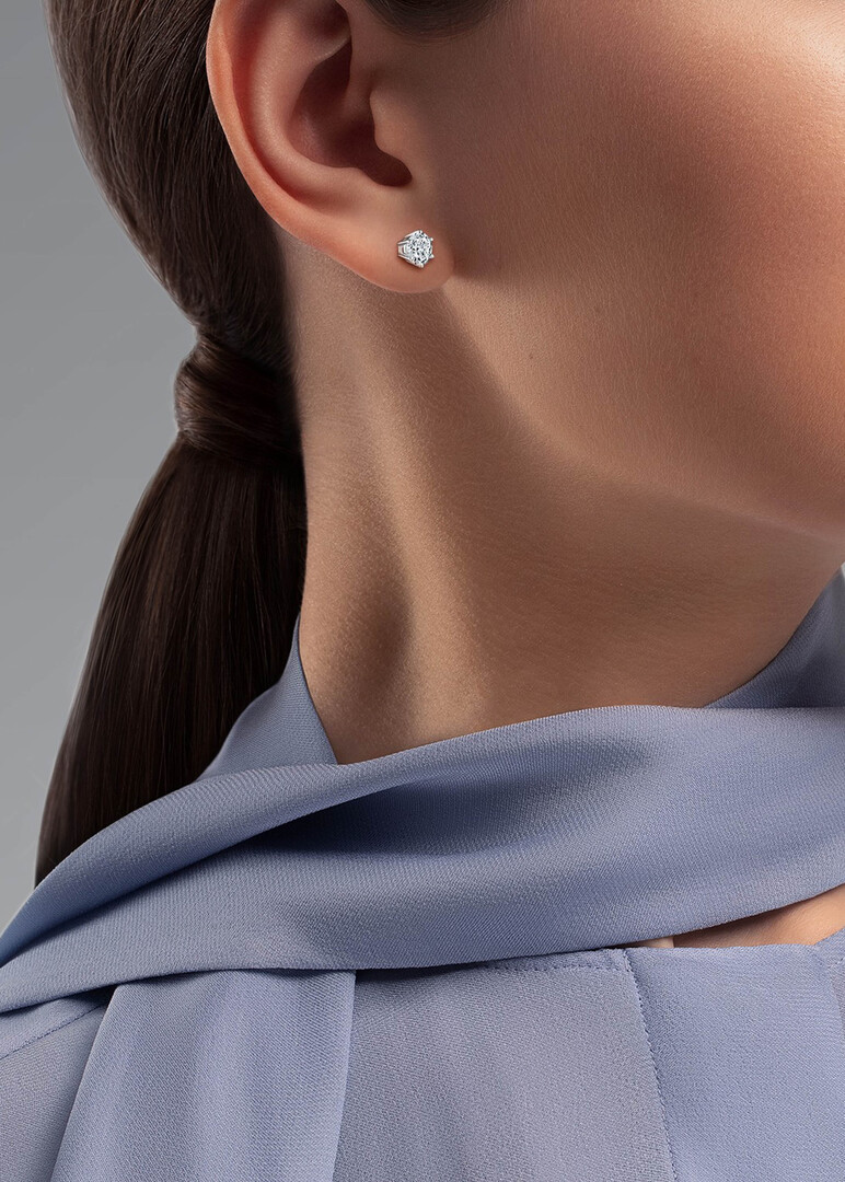 White gold poussettes with diamonds