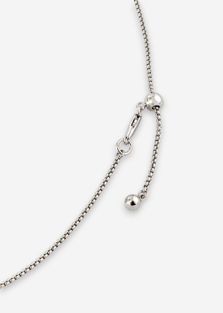 silver necklace with crystal pendant