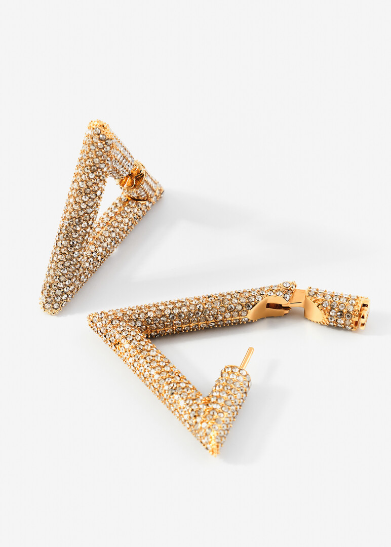 gold earrings with crystals