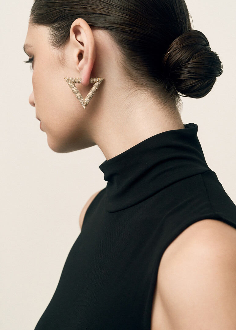 gold earrings with crystals
