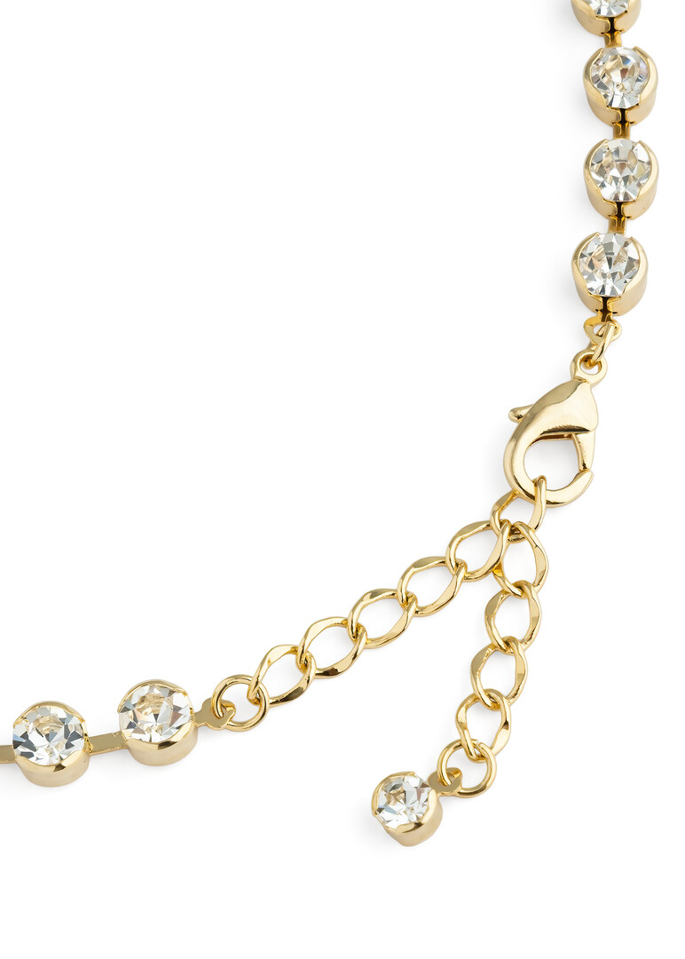 sautoire with crystals and a cross pendant