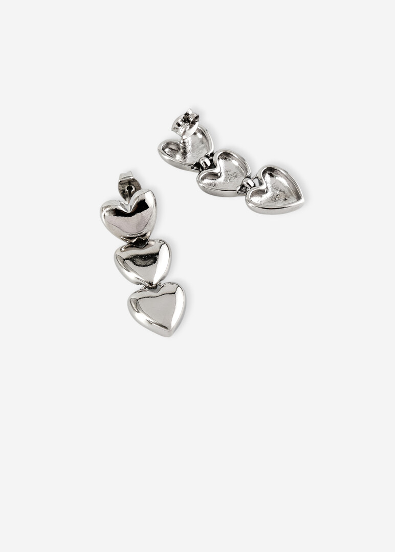 Серебристые серьги из трех сердец