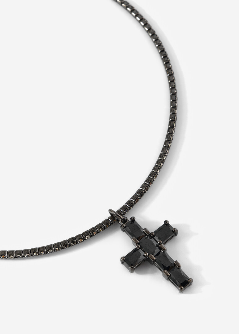 black choker with crystals and a cross