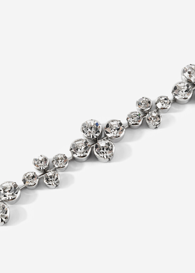 A bracelet made of flowers with crystals