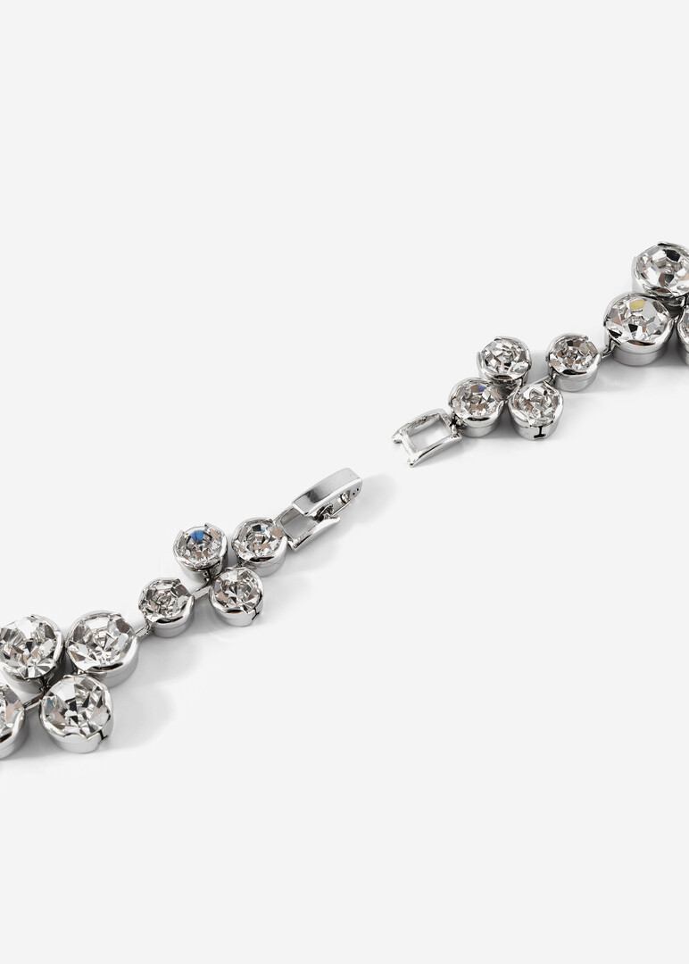 A bracelet made of flowers with crystals