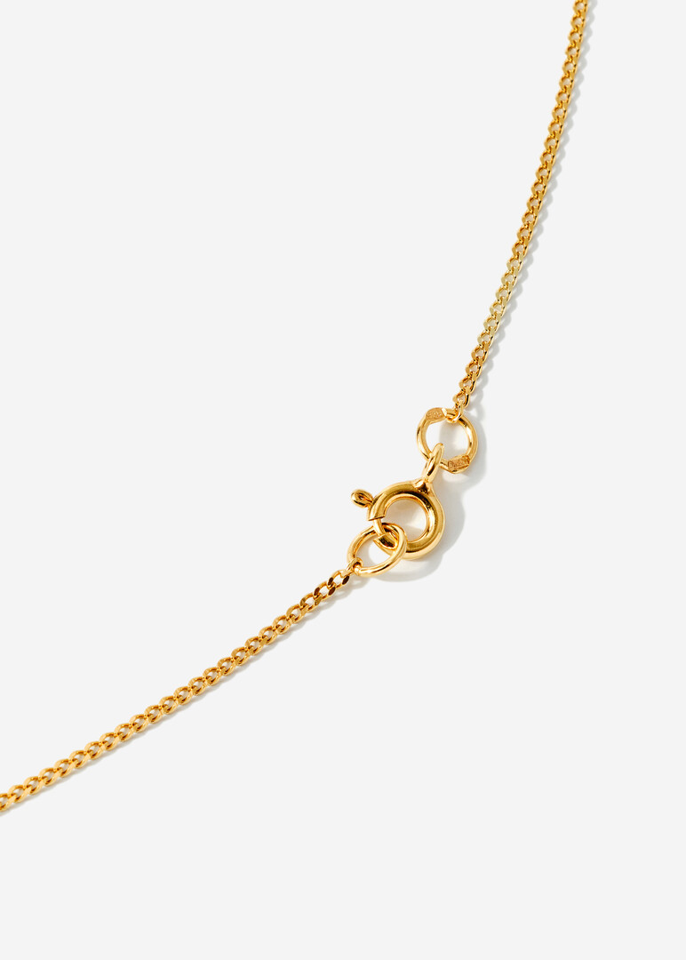 gold plated silver necklace with a small heart