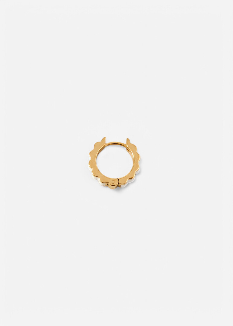 gold Memphis piercing with white enamel