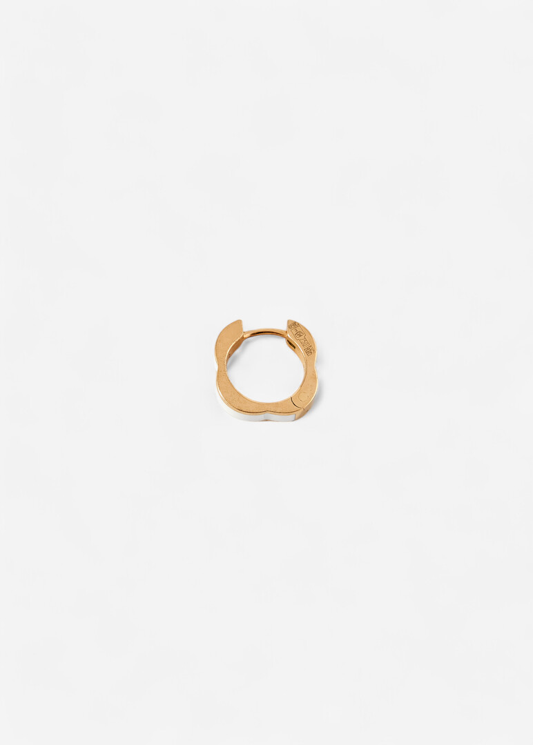 gold piercing with white enamel Ducale