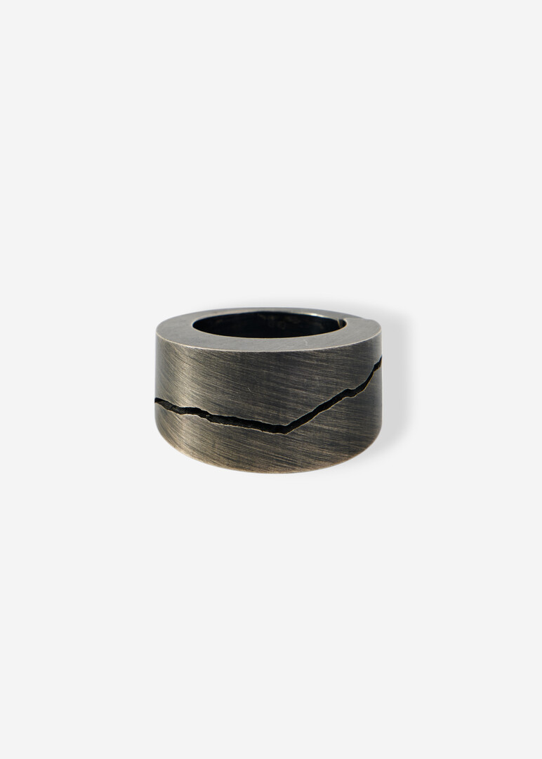 Silver ring with a crack