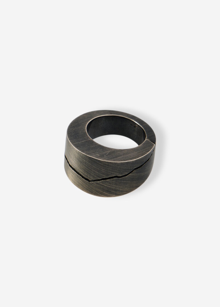 Silver ring with a crack