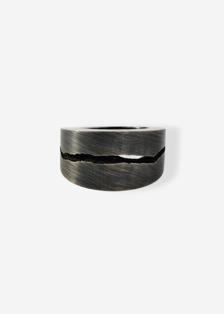 Silver ring with a crack