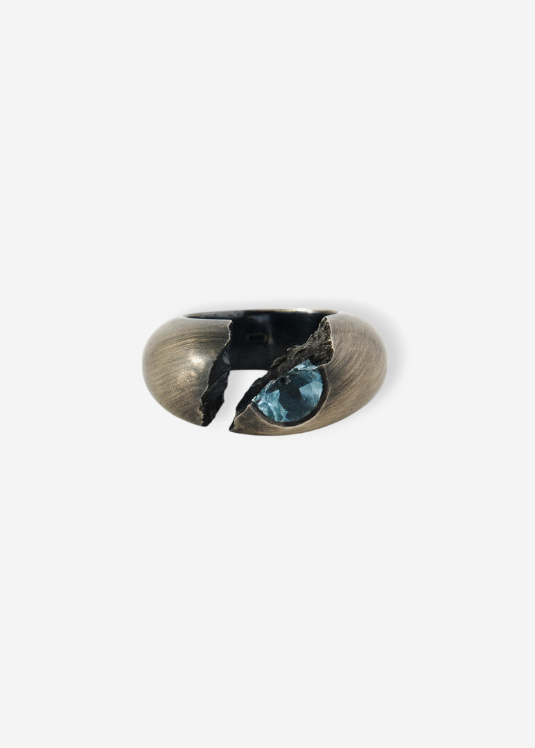 Silver ring with topaz