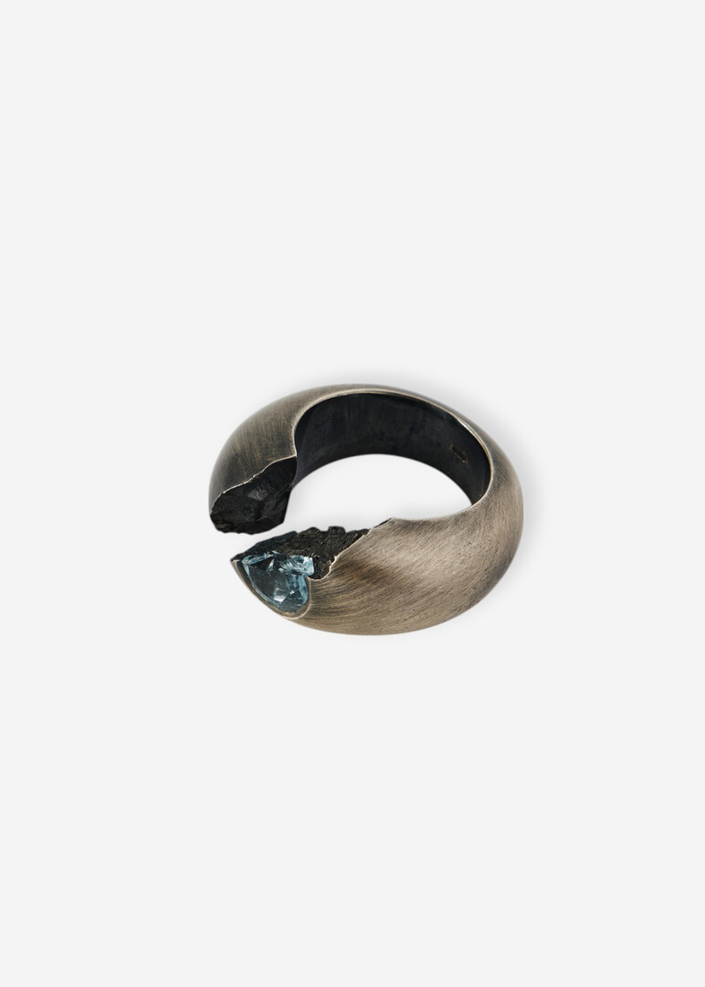 Silver ring with topaz