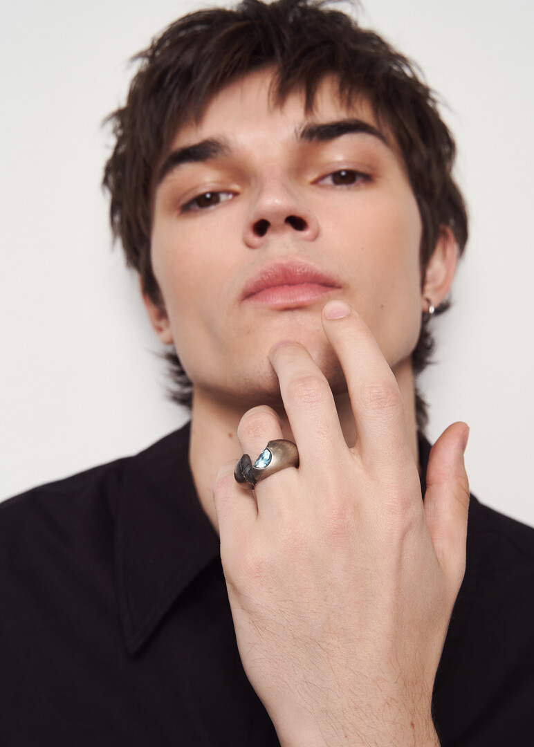 Silver ring with topaz