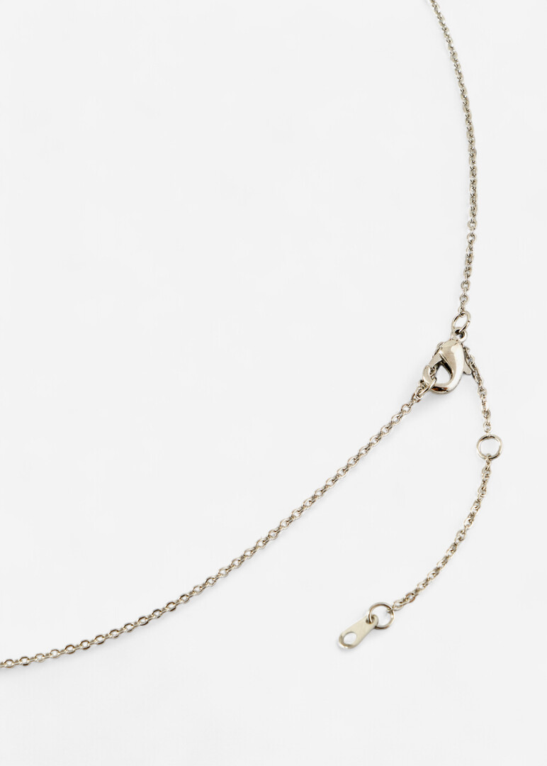 Silver oval pendant with crystal pavé
