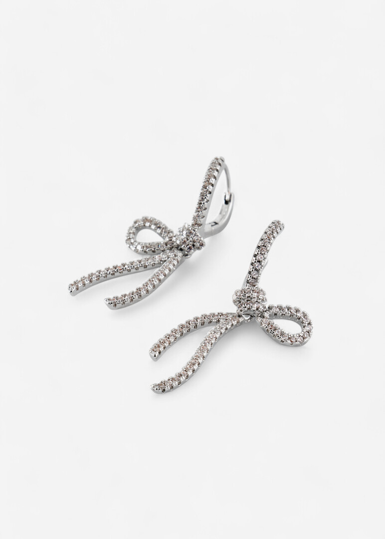 Silver bow earrings with crystals