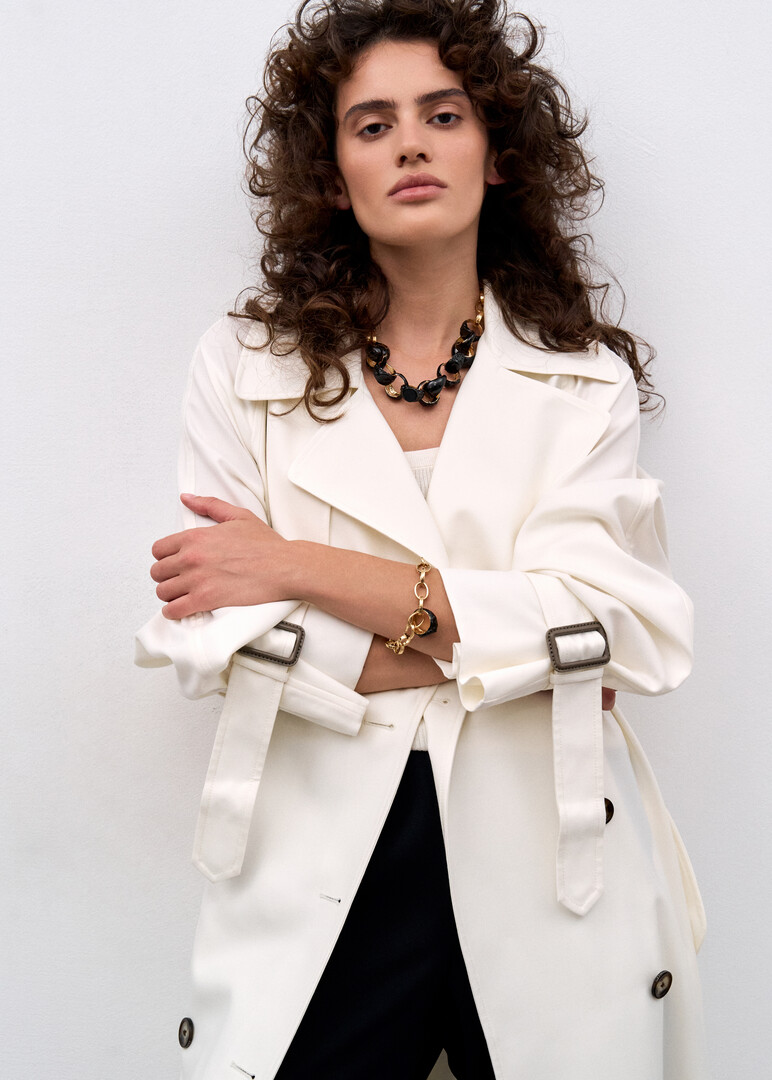 gold-tone chain with black enameled ring