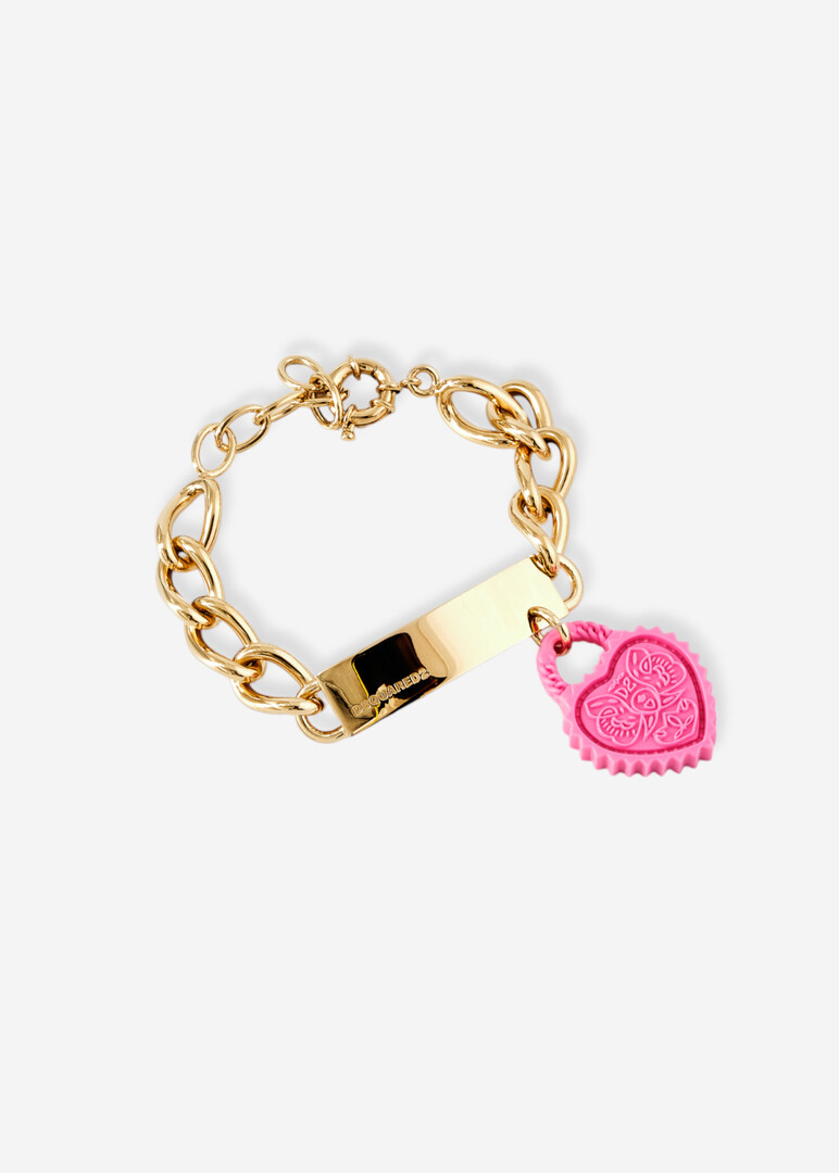 Golden chain bracelet with a pink heart