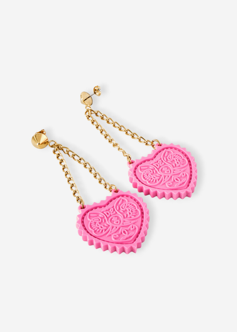 earrings with a pendant in the shape of a pink heart