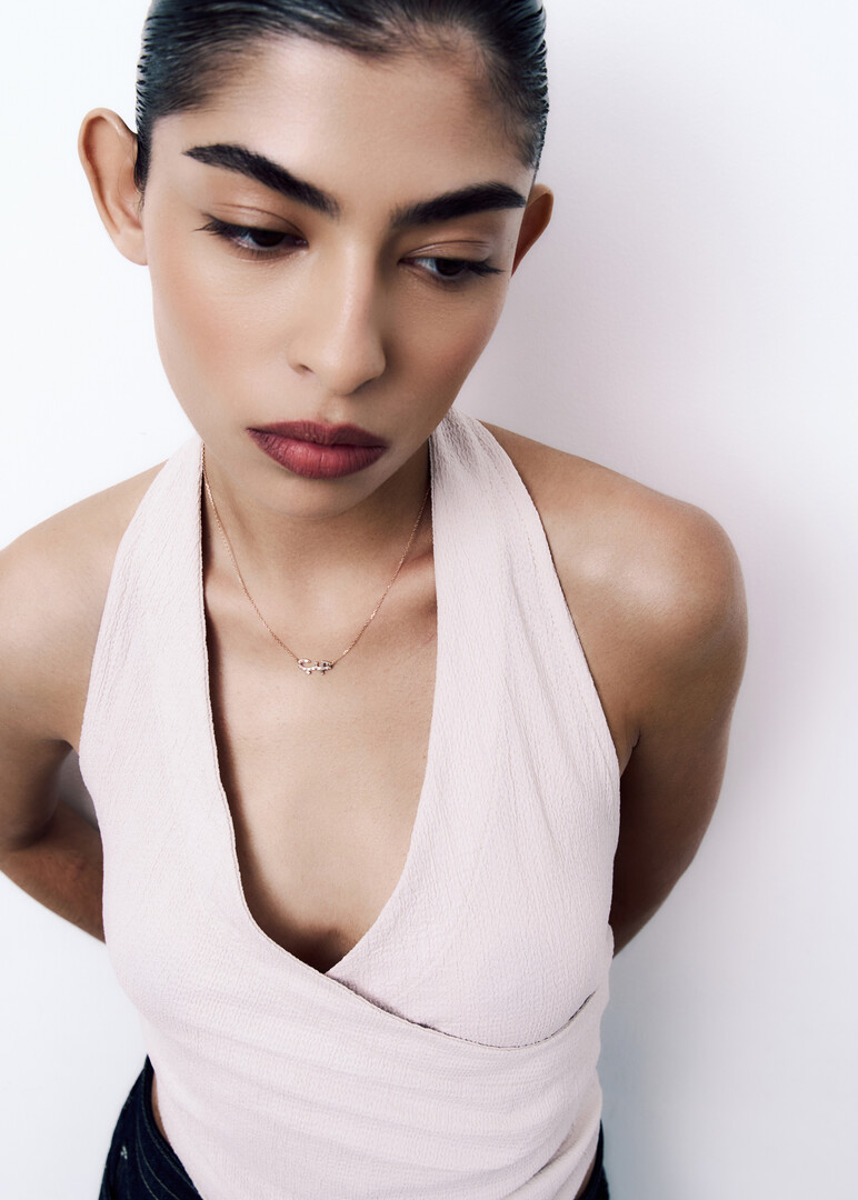 rose gold love necklace with baguette diamonds