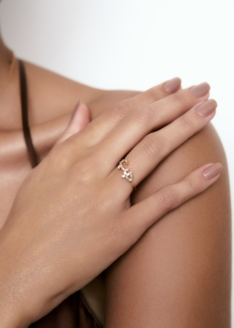 Yellow gold ring "Love" with white baguette diamonds