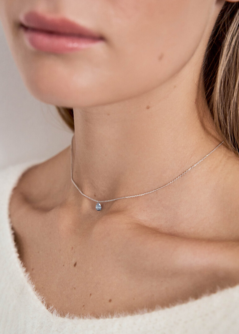 White gold necklace with blue grown pear shape diamond