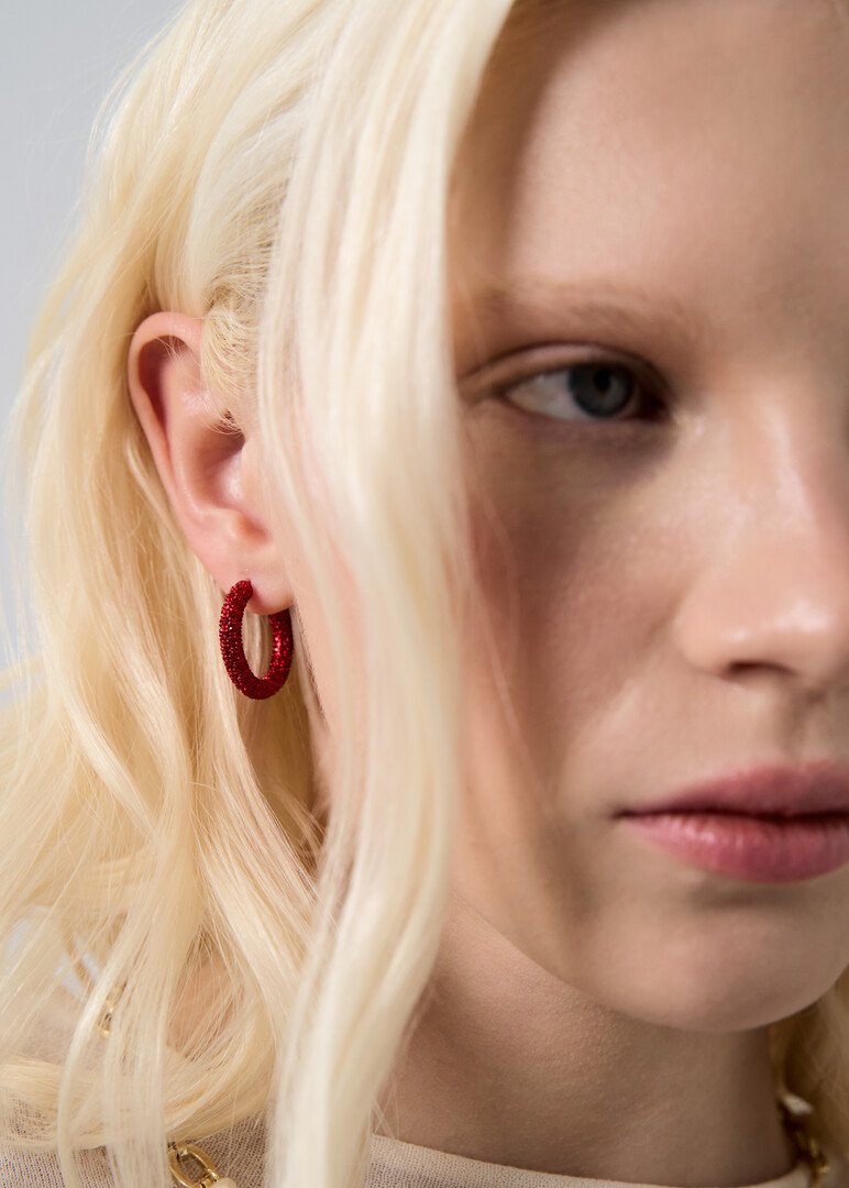 Large hoop earrings with red crystals