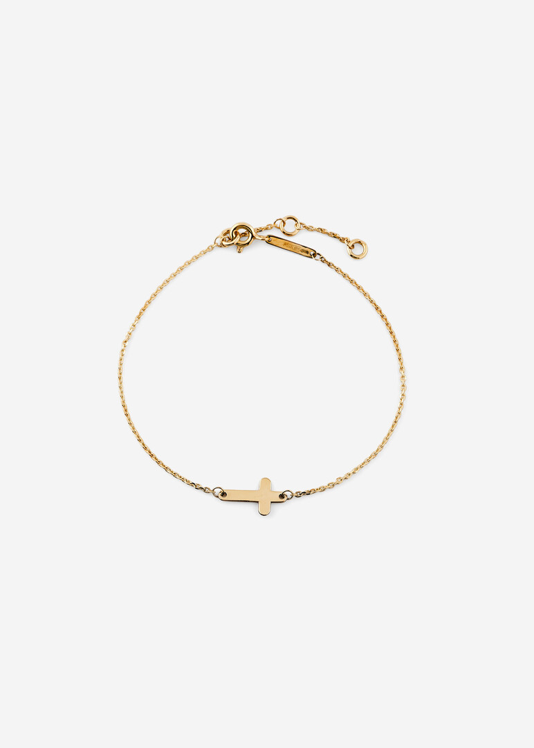 gold bracelet with a cross