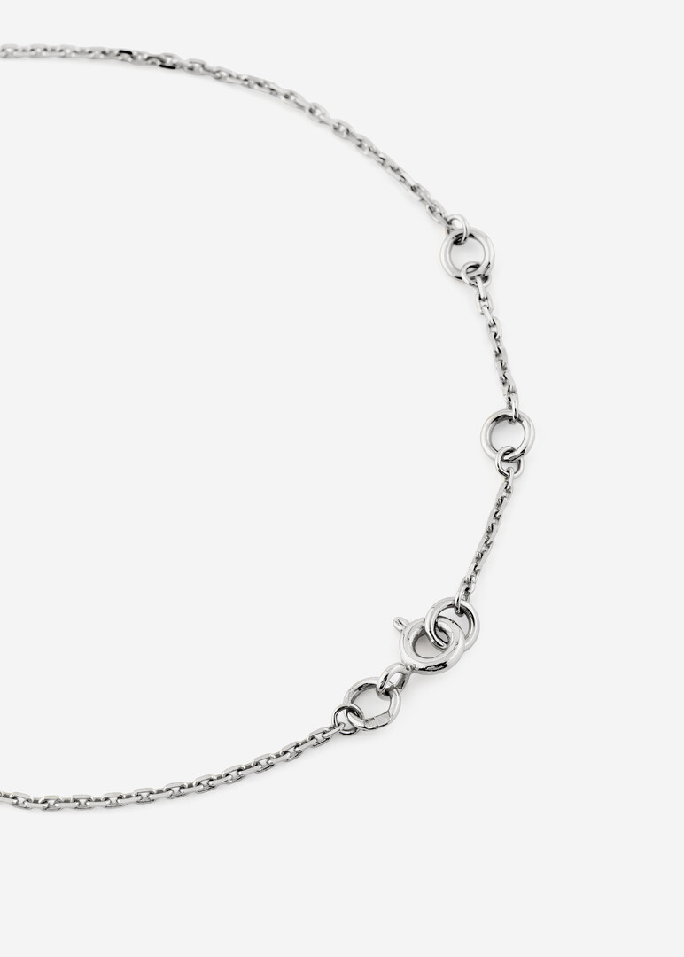 rhodium-plated gold cross bracelet
