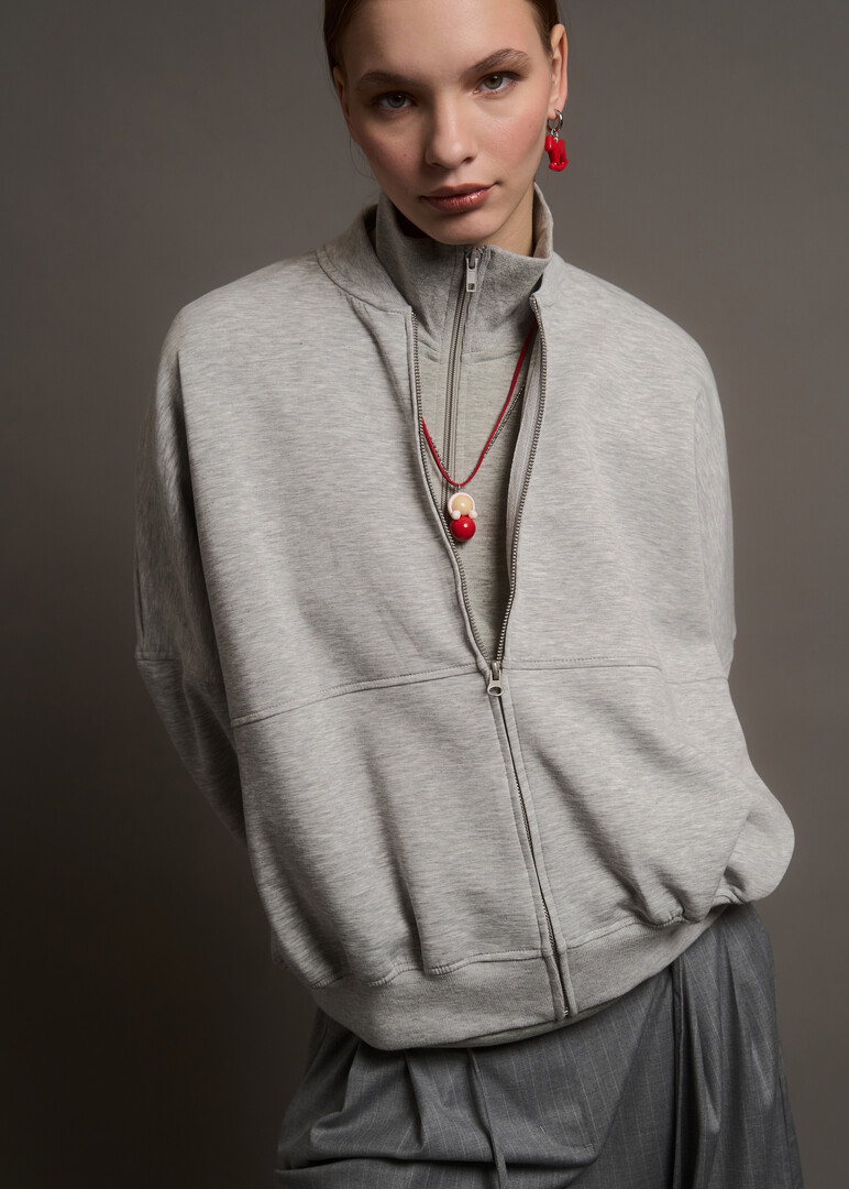 Tumbler pendant on a stainless steel chain complete with a red lace