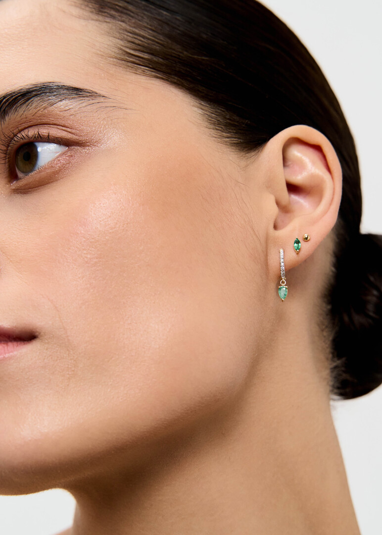 gold earrings with emeralds and cubic zirconia
