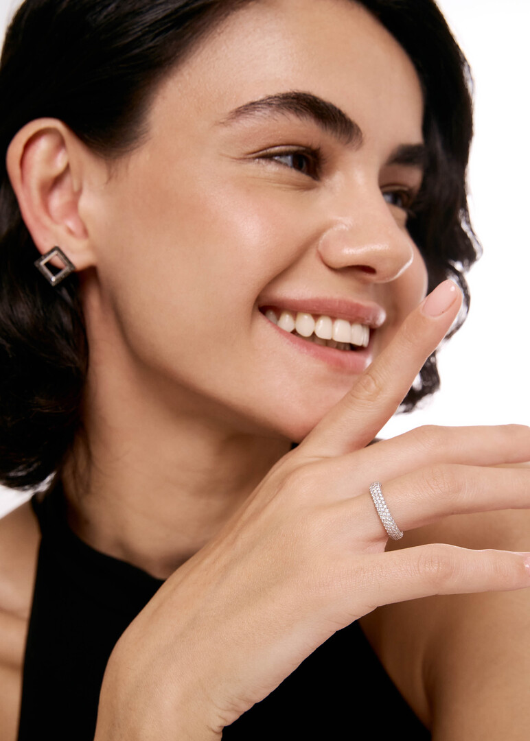 Gold ring with a diamond overlay