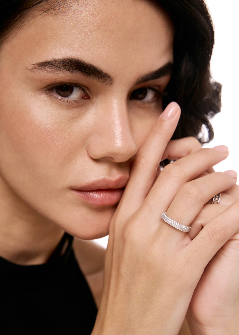 Gold ring with a diamond overlay
