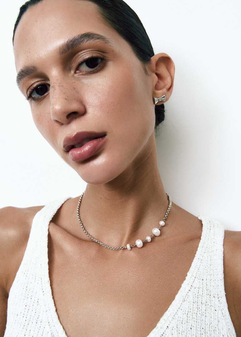 silver bow mono-earring