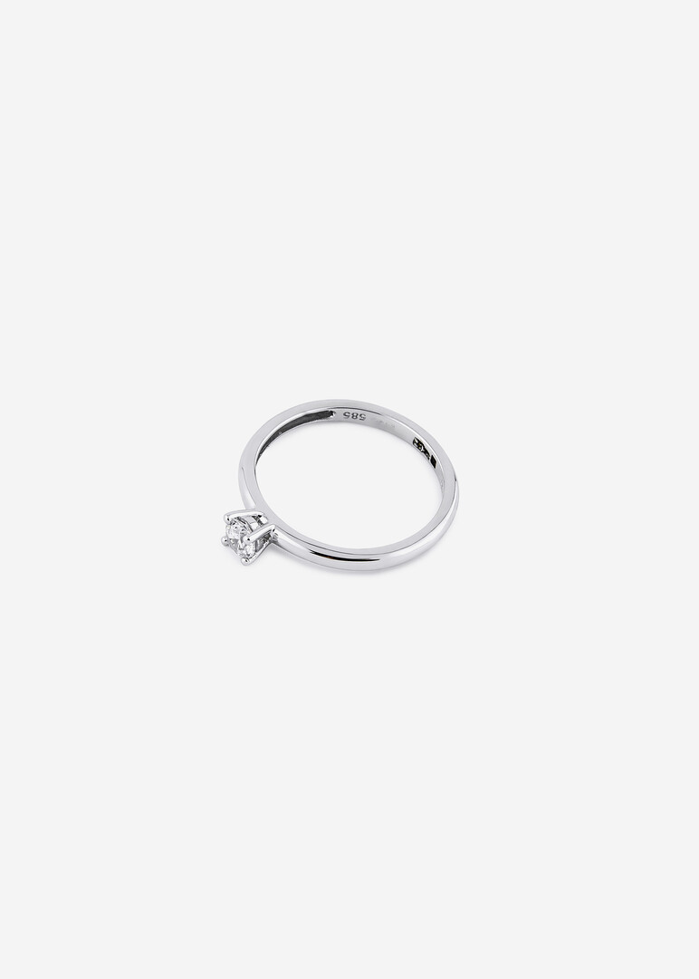 white gold ring with a cubic zirconia