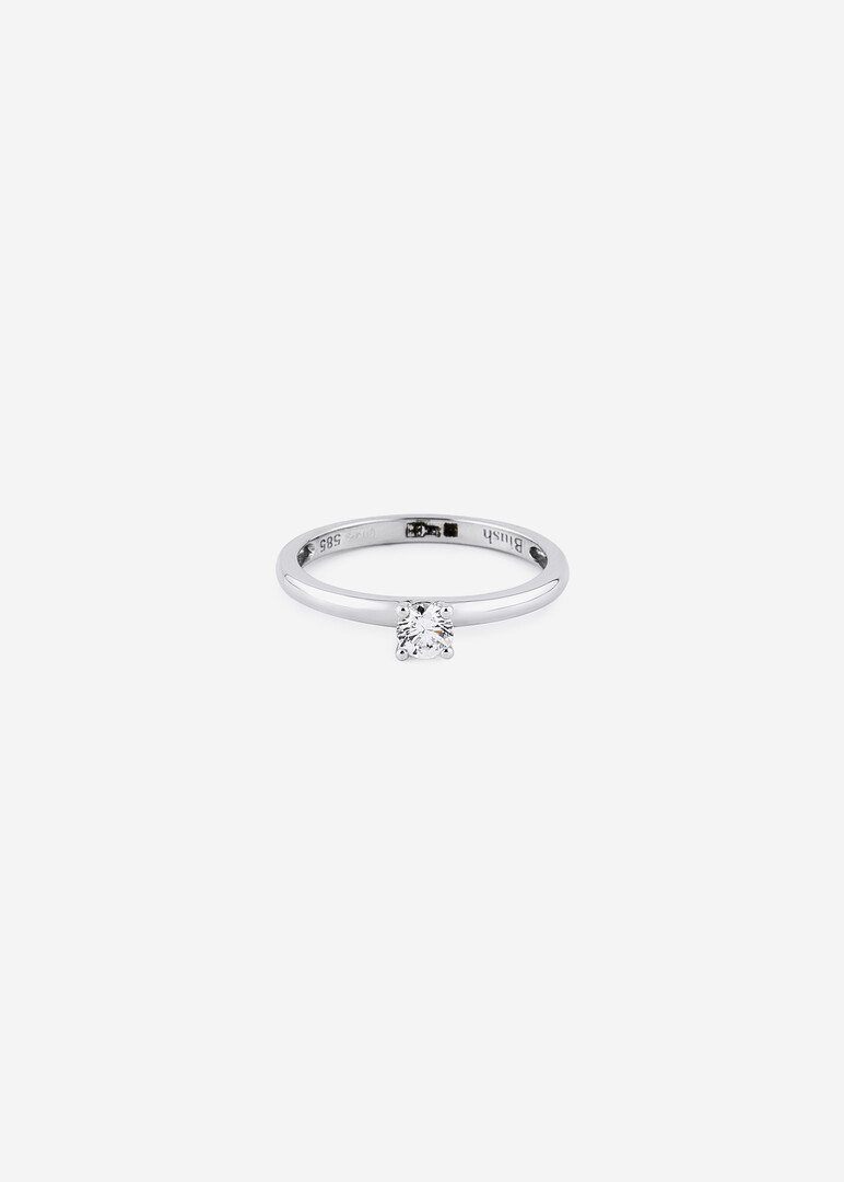 white gold ring with a cubic zirconia
