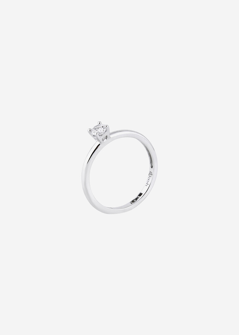 white gold ring with a cubic zirconia