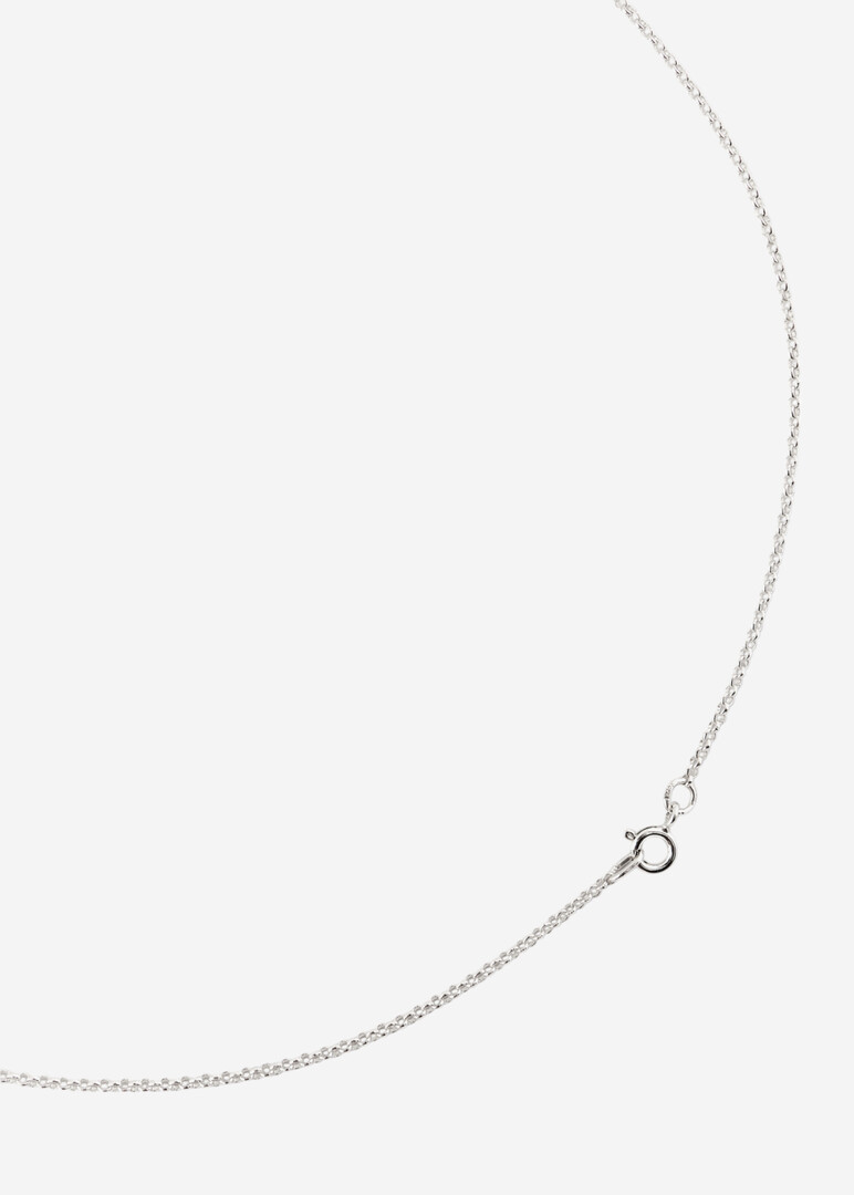 Silver pendant on an Endless Knot chain
