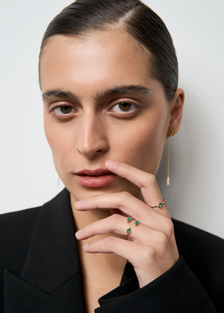 Gold ring with emeralds
