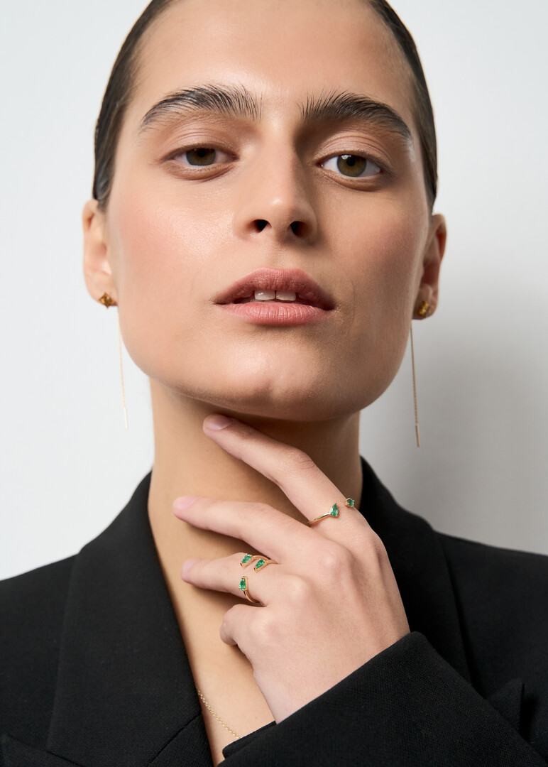Gold ring with emeralds